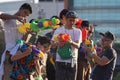 Teenage play water during Songkran